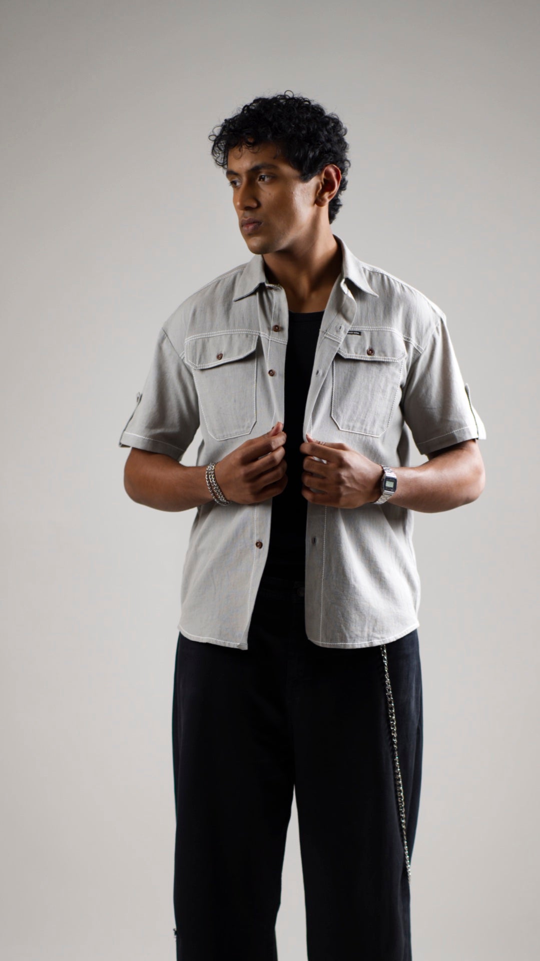 Man wearing a gray cotton linen half-sleeve shirt