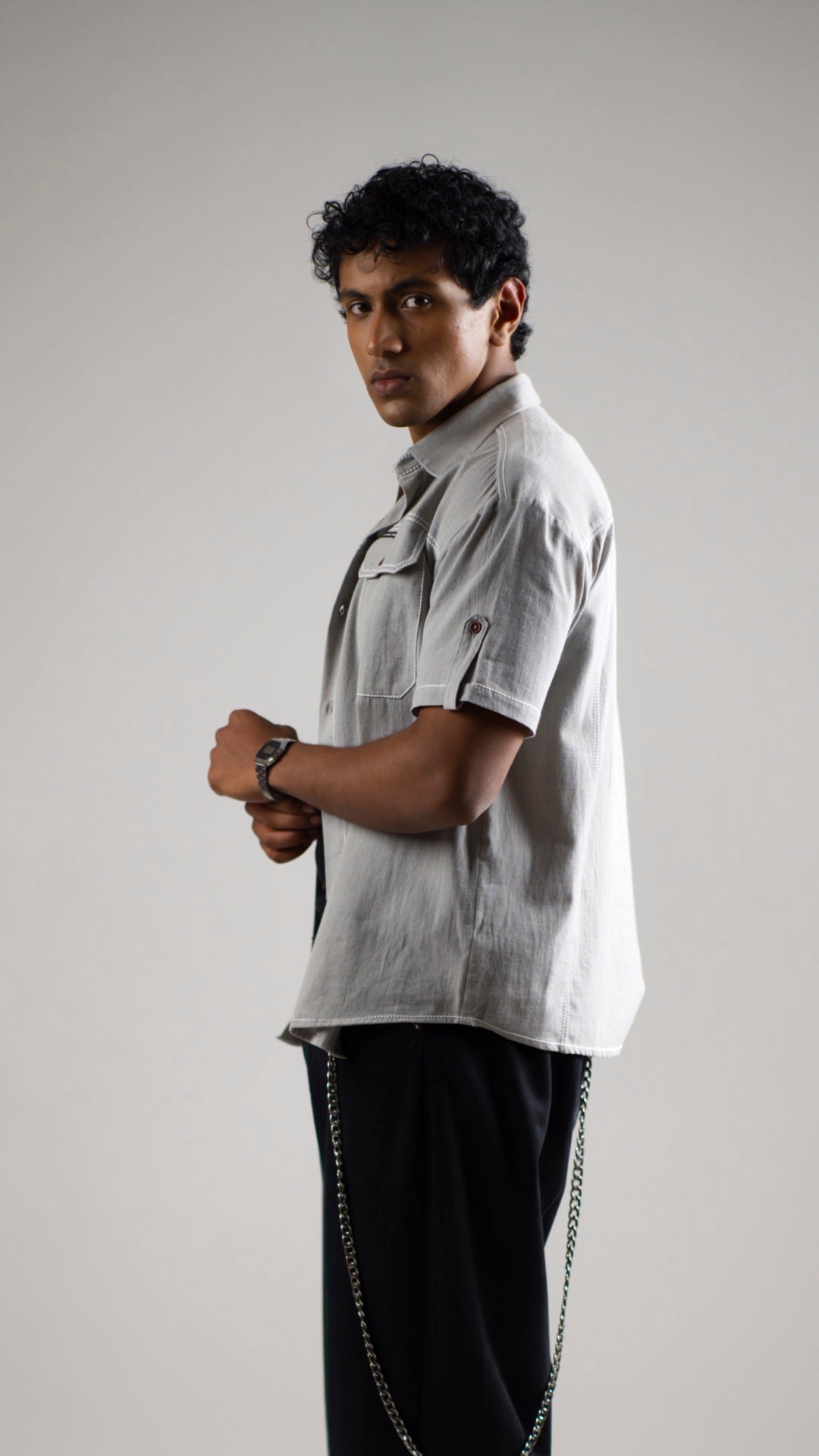 Man wearing a gray cotton linen half-sleeve shirt
